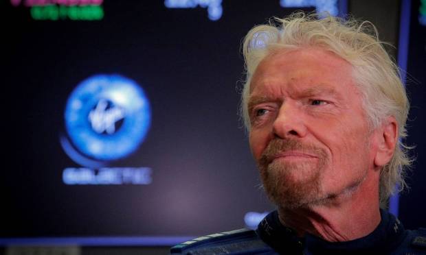 Billionaire Sir Richard Branson took the lead and flew into space on Sunday, July 11, ahead of Jeff Bezos, but not quite up to the Amazon founder Image: BRENDAN MCDERMID / REUTERS
