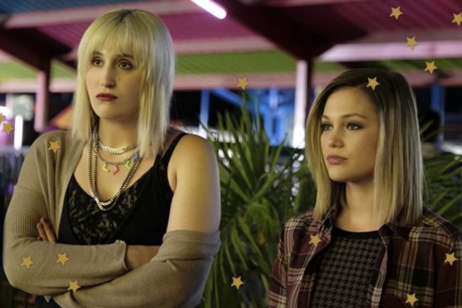 Cruel Summer Mallory and Kate Focus on the faces of Mallory and Kate's characters, with serious expressions looking at someone.