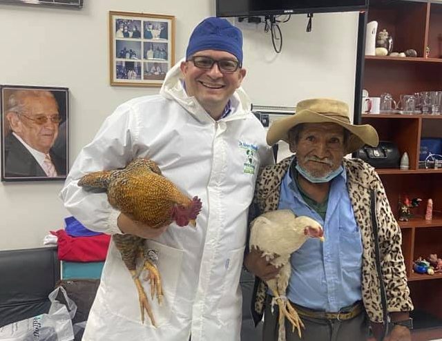 The doctor performs a free surgery for an elderly man who offers him two chickens as a payment