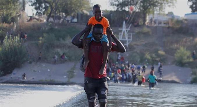 US closes border bridge after Haitians - News