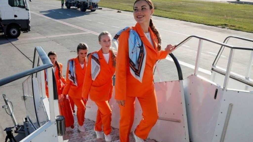 Ukrainian company incorporates sneakers and trousers into flight attendant uniforms |  who are they