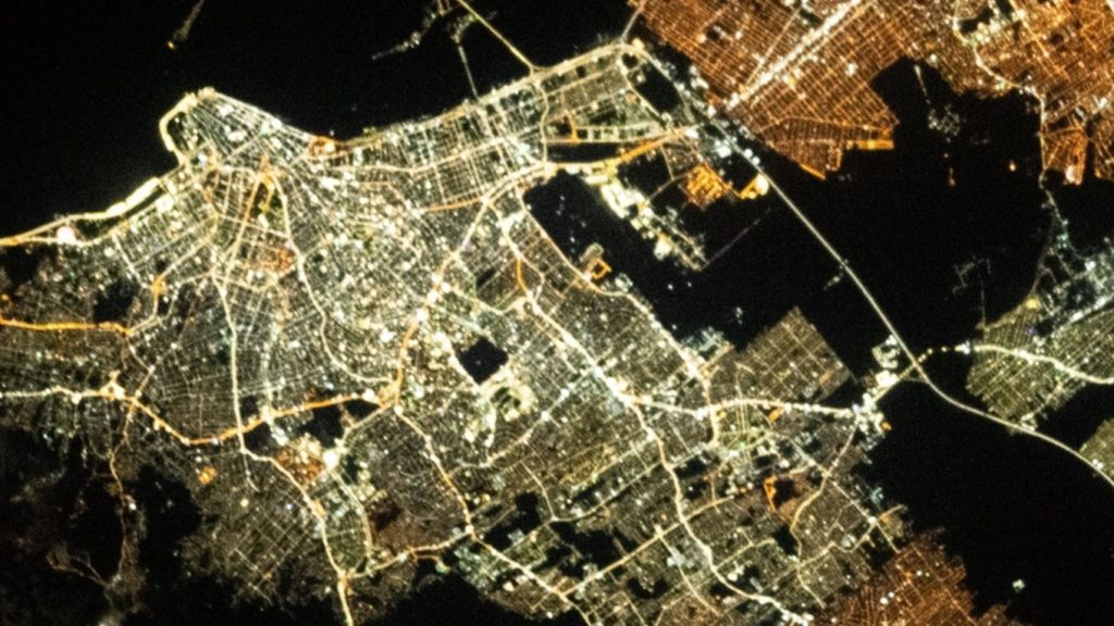 An astronaut on the space station photographing the Greater Porto Alegre at night