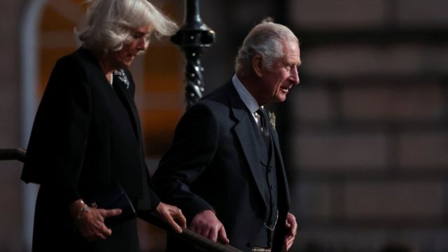 King Charles III and Queen Consort Camilla walking