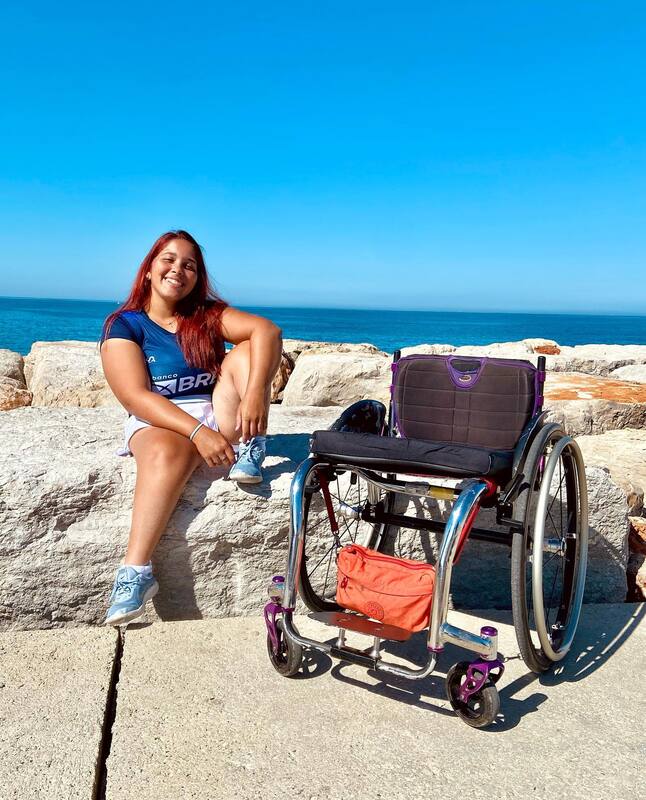 Jade was sitting next to the wheelchair facing the ocean