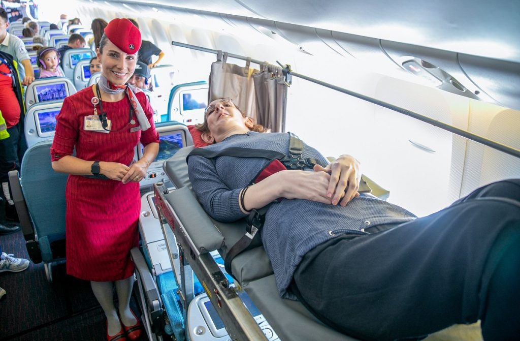 The world’s tallest woman flies for the first time in a 13-hour flight