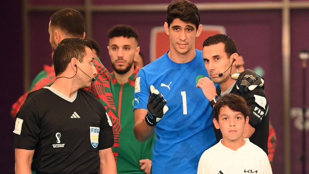 The Morocco goalkeeper sings the anthem and is substituted before the match against Belgium and becomes the subject of the net