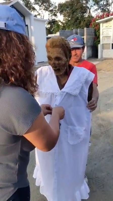 The body of an elderly woman who died ten years ago is removed from her preserved sarcophagus and is still standing in the Dominican Republic