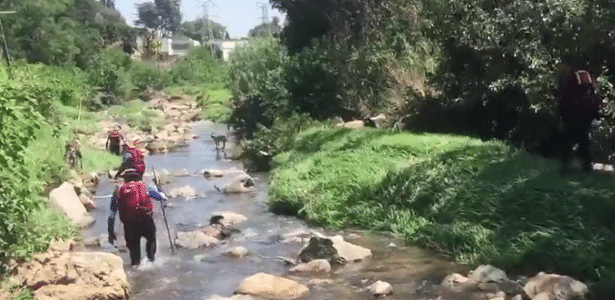 9 dead believers and 8 missing after flooding during a ritual in the river